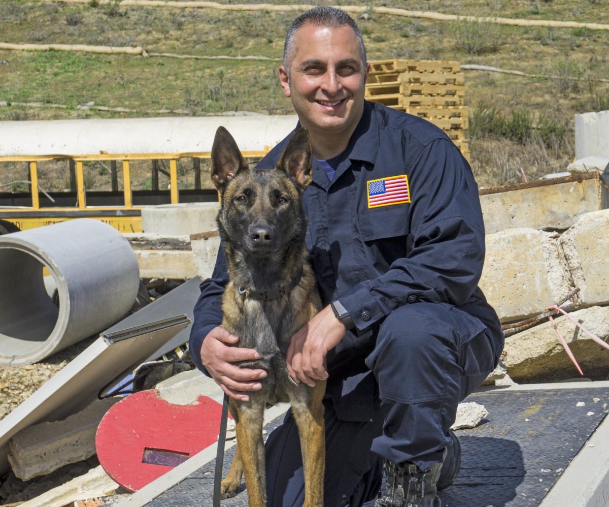 Battalion Chief Barbat and his Search and Rescue dog Delta