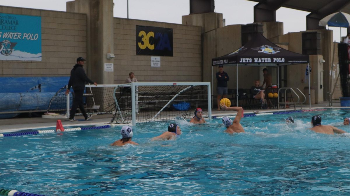 Mesa no. 10 Santiago Gonzalez scoring on Miramar no. 1 Jason Brouard. 
