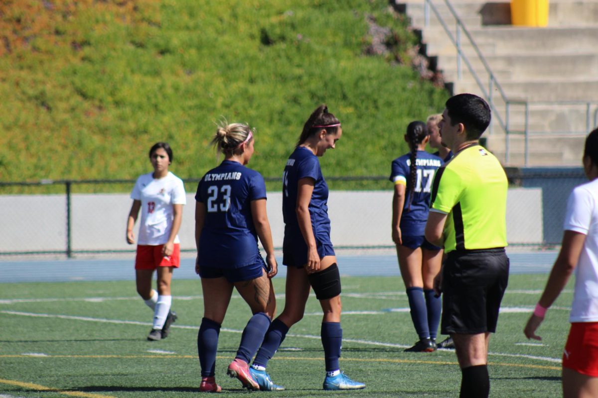 Paradyse Wong walks back to the center circle after scoring during the Olympians' 13-0 victory over Imperial Valley on Oct. 18.